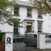 Fans still flock to The Abbey Road Studios in St John's Wood to leave their graffiti on the white wall and walk across the nearby zebra crossing