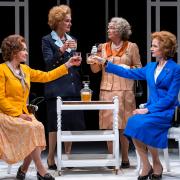 A scene from Handbagged by Moira Buffini at Kiln Theatre: Abigail Cruttenden (Liz), Kate Fahy (T), Marion Bailey (Q), Naomi Frederick (Mags).