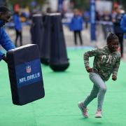 Youngsters can try training drills ahead of the 2022 NFL London Games