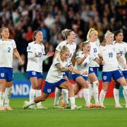 England players celebrate during their penalty shoot-out with Nigeria