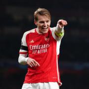 Martin Odegaard celebrates Arsenal's fifth goal against Lens