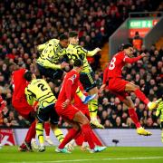 Gabriel heads Arsenal into an early lead against Liverpool