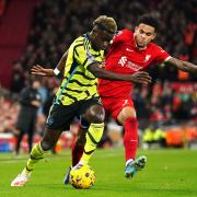 Arsenal's Bukayo Saka attacks against Liverpool