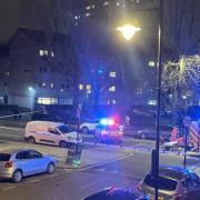 Emergency services respond to a crash between a motorcylist and a car in Holloway