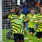 Arsenal's Bukayo Saka celebrates scoring their side's third goal of the game during the Premier League match at Turf Moor, Burnley. Picture date: Saturday February 17, 2024.