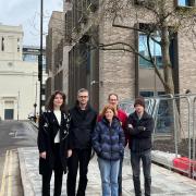 Anton Tol (second from left) and neighbours in front of the new hospital building