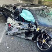 The wreckage of the Ferrari 296 GTB after it crashed in St Paul's Road, Highbury