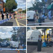 Pictures of police and forensics after a stabbing on Stroud Green Road