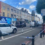 A second crime scene in place on Seven Sisters Road where police said the incident began