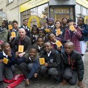 Nick Hornby with young writers he supported at Ministry Of Stories in Hoxton