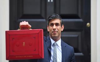 Chancellor of the Exchequer, Rishi Sunak, holds his ministerial 'Red Box' outside 11 Downing Street, London, before heading to the House of Commons to deliver his Budget.