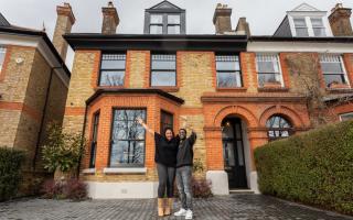 Kevin Johnson and his wife Dee celebrate winning the Omaze £3 million house near Finsbury Park station