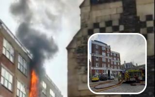 A man was treated at the scene after escaping a fire that damaged two flats close to St Bartholomew the Great's Church in the Barbican area