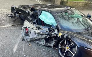 The wreckage of the Ferrari 296 GTB after it crashed in St Paul's Road, Highbury